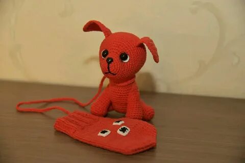 Собака варежка