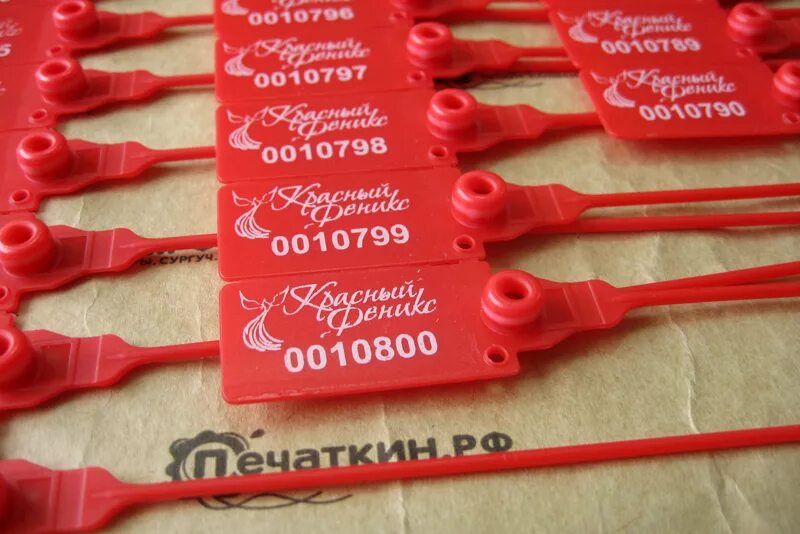 Силиконовые бирки для одежды. Пломба на контейнер. Пломбы с логотипом. Пломба номерная. Бирка пломба.