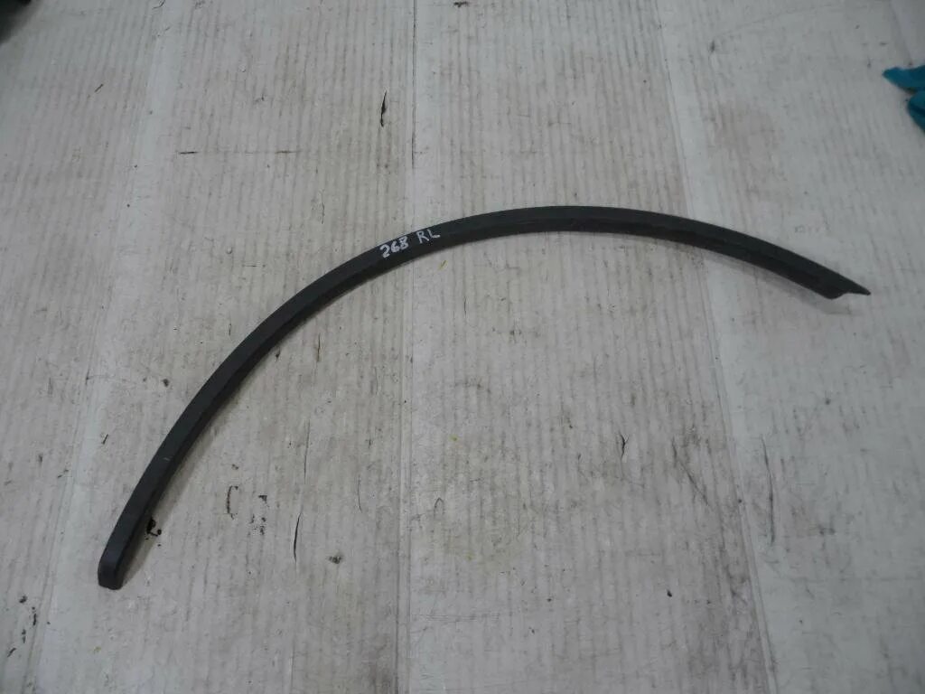 Молдинг крыла логан. Молдинг арки крыла рено логан. Накладки на крылья рено логан 1. Логан 2012 молдинг арки крыла задний левый артикул. Молдинги арки крыла на рено логан 1.