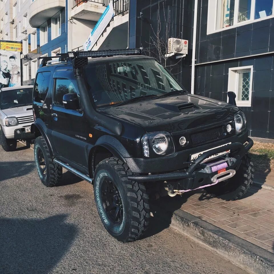 Suzuki tune. Suzuki Jimny 2020 Tuning. Suzuki Jimny 3 Tuning. Suzuki Jimny 3. Suzuki Jimny 2010 обвес.