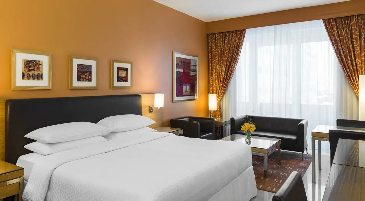 Four points by sheraton downtown. Four points by sheraton downtown 4 оаэ дубай. four points by sheraton downtown 4*. four points by sheraton 4 дубай фото. four points by sheraton downtown 4* dubai здание отеля.