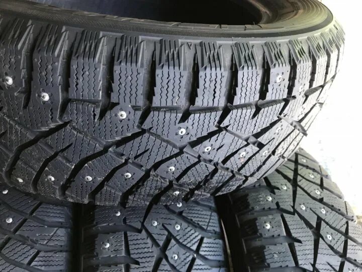 Нитто шипованная шина. Nitto therma spike 195/65 r15 91t. Шины therma spike r15. Nitto therma spike 295/40r21 106t. Нитто шипованная шина.