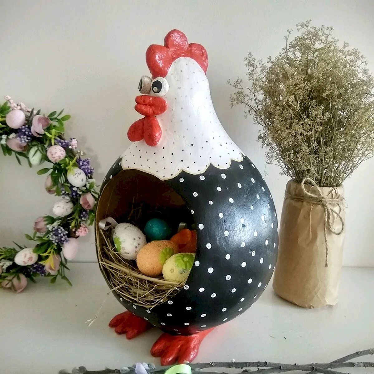 Easter Decoration of Hen in the Nest and Wicker Basket with Eggs Stock Photo I
