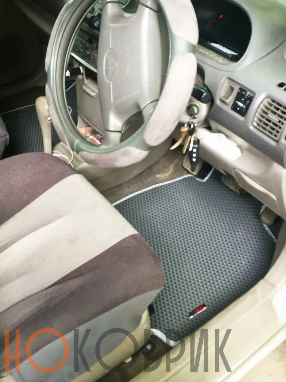Спасио эва фото салона. Коврики toyota corolla 120 кузов. Коврики тойота спасио 110 кузов. Коврики салона тойота королла 2002. Резиновые коврики на тойота королла спасио 124 кузов.