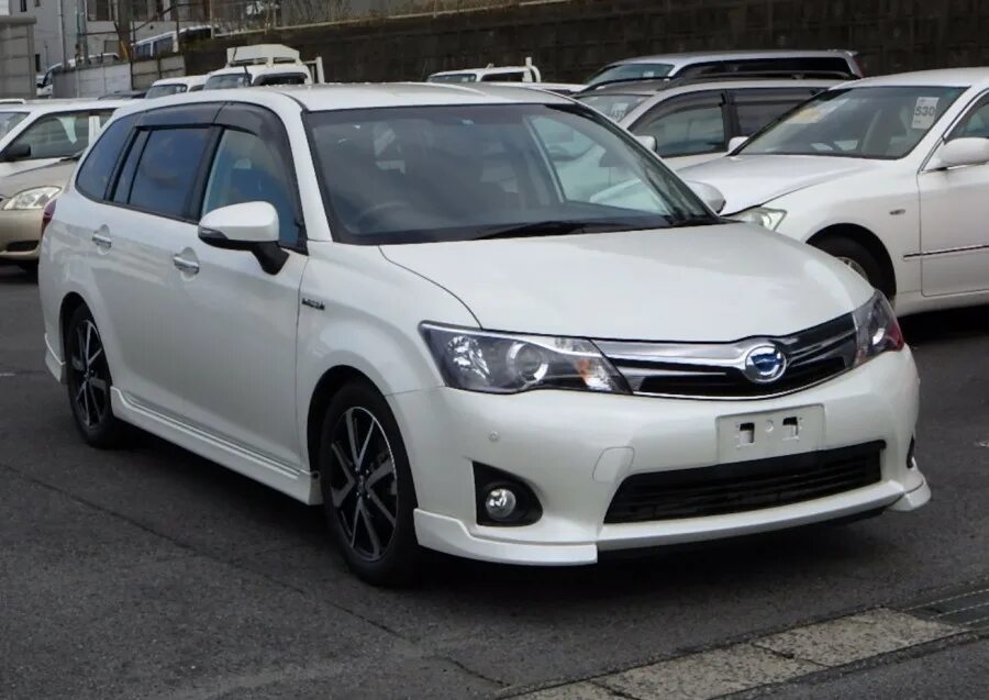 Тойота карола филдер 2015 гибрид. Филдер 17 года. Toyota corolla fielder 2014. Toyota · corolla fielder · ix. Тойота филдер 2014.