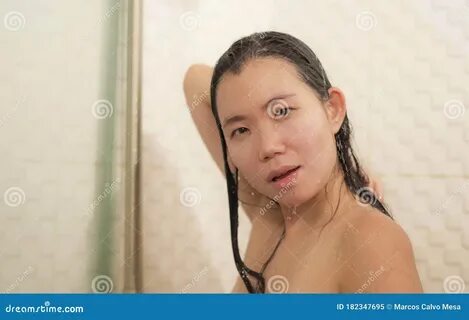 Chinese girl taking shower.