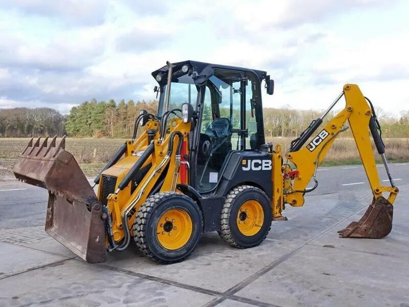 Экскаваторы погрузчики jcb б у. Экскаватор-погрузчик JCB 1cx. Погрузчик JCB 1cx. Мини погрузчик JCB 1cx. JSB экскаватор 1cx.