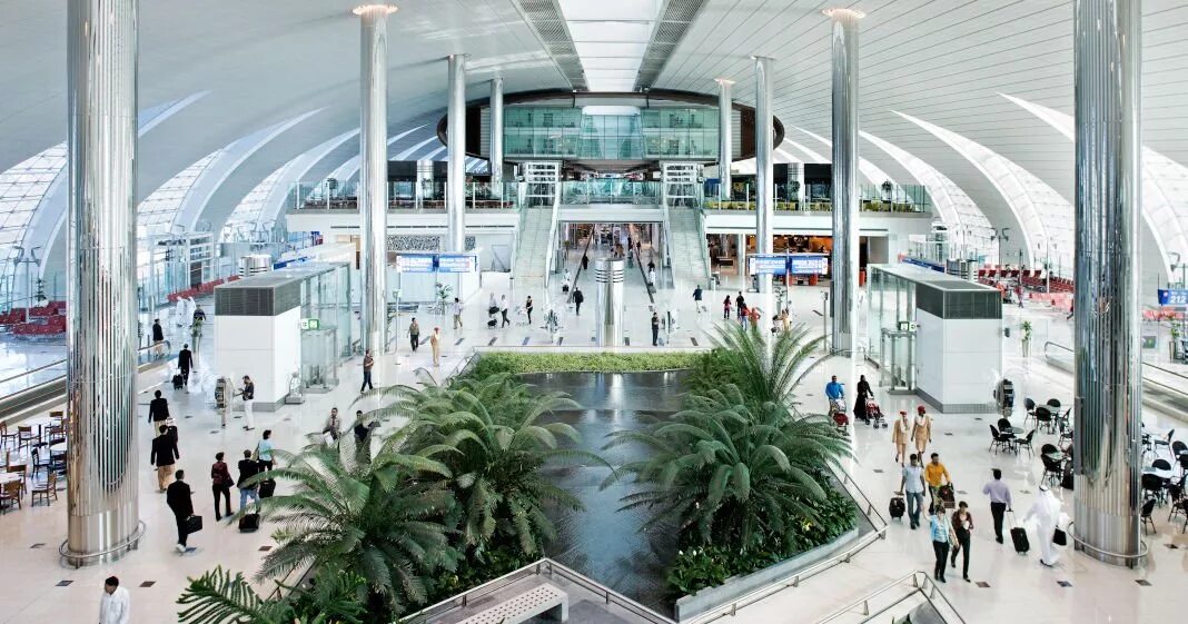 Эмирейтс какой терминал. Аэропорт дубай dxb. международный аэропорт дубай терминал 3. аэропорт дубай терминал эмирейтс. дубай интернешнл аэропорт.