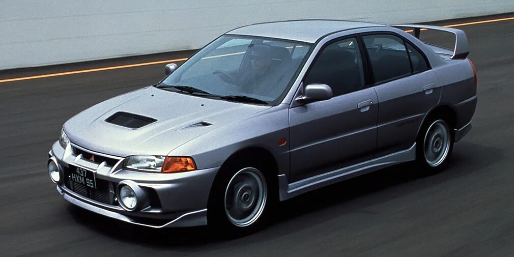 Митсубиси первого поколения. Mitsubishi Lancer Evolution 4. Mitsubishi Lancer EVO 1996. Mitsubishi EVO 4. Mitsubishi Lancer Evolution IV GSR 1996.