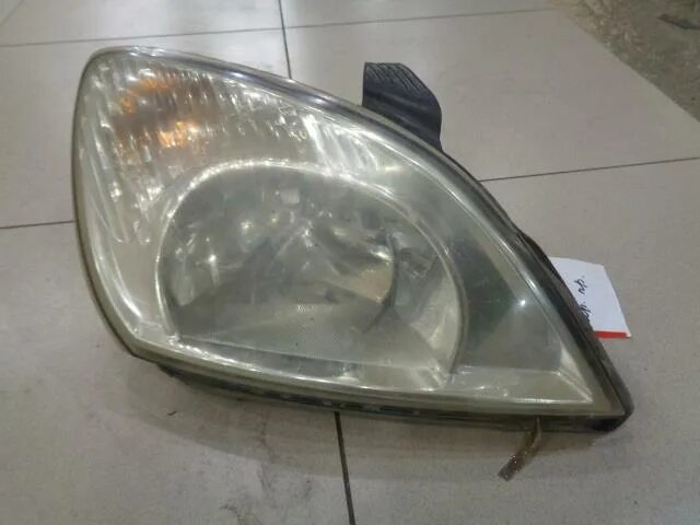 Фара чери тигго т11. Фары чери тигго. Фара чери тигго т11 фл. Фара чери тига т 11. Фара черри тигго 2009 год.