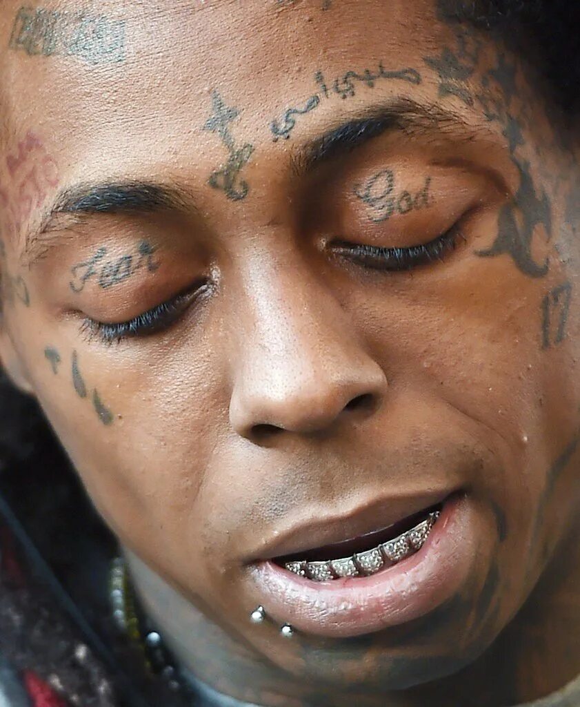 Lil Wayne лицо. Лил Вейн тату.