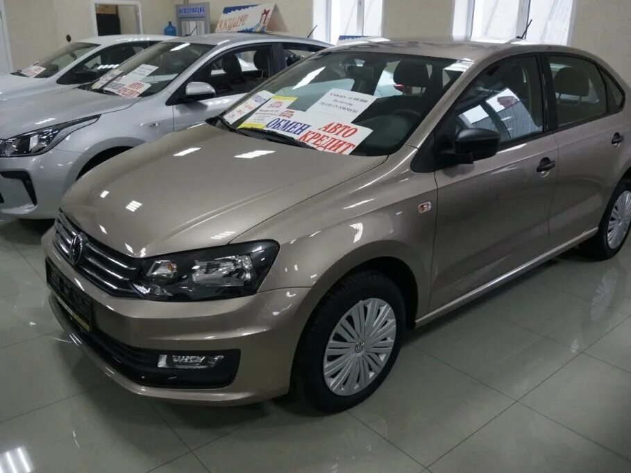 Купить фольксваген поло в новгороде. Фольксваген поло Toffee. Volkswagen Polo 565 Нижний Новгород. Фольксваген поло Нижний Новгород 2014. Бежевый поло седан.