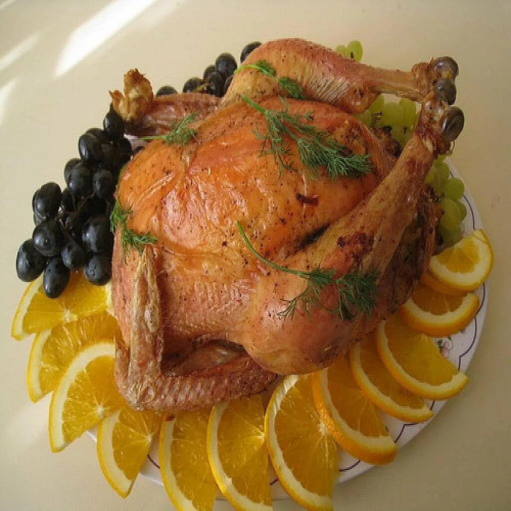 Праздничная курица фото. Утка фаршированная. фаршированная курица. курица фаршированная фото.