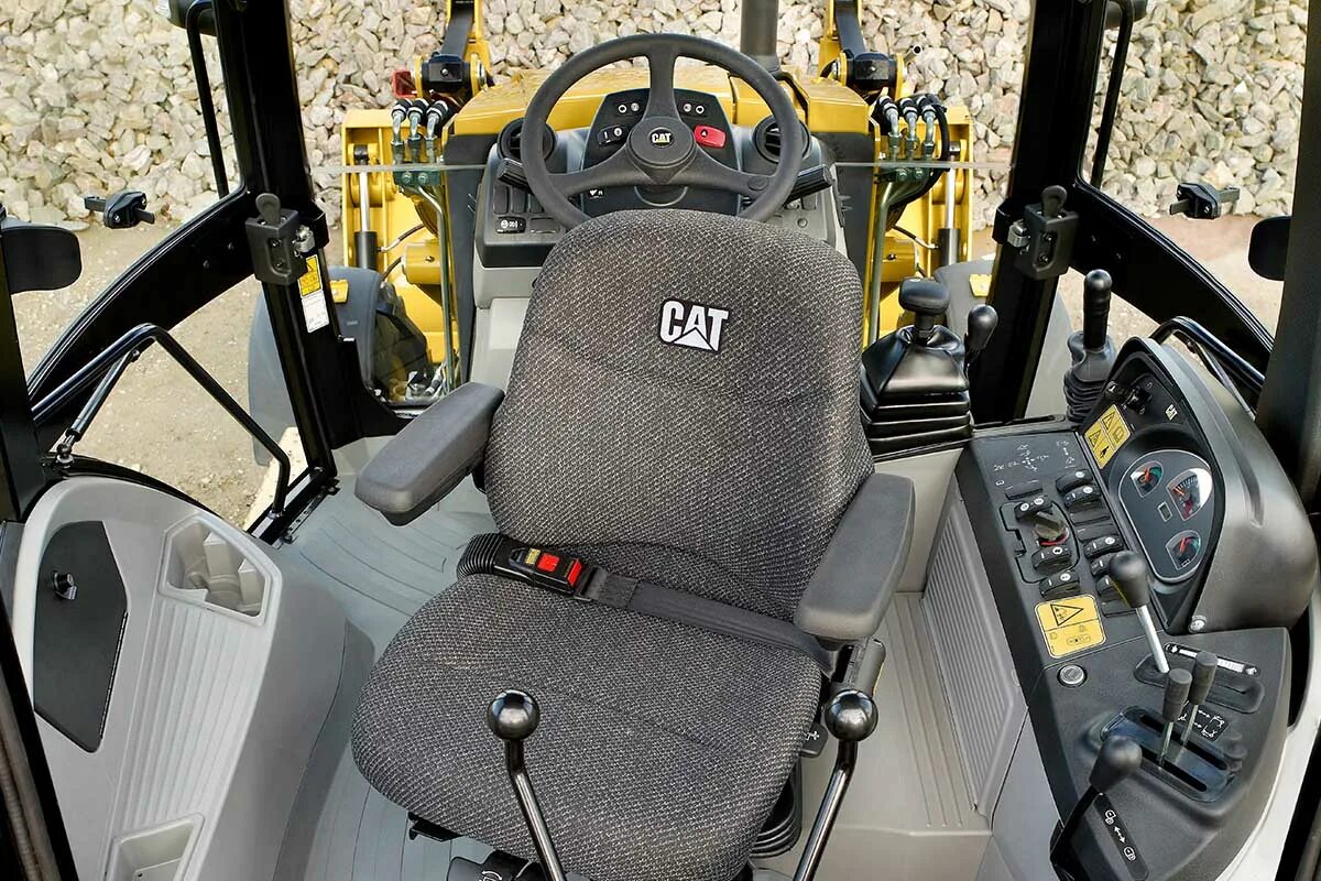 Экскаватор-погрузчик Caterpillar 428. Катерпиллер 428f. Экскаватор погрузчик Cat 428f. Катерпиллер 428 кабина. Салон экскаватора