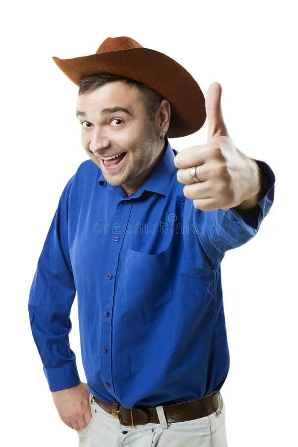 Мужчина в шляпе показывает палец. Ковбой показывает класс. Радостный ковбой. Ковбой показывает пальцем. Мел показал шляпу