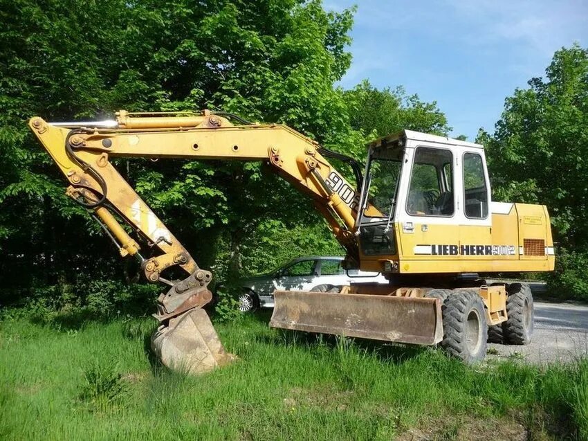 Авито москва экскаватор. Liebherr 902. Экскаватор Либхер 902. Liebherr 902 колесный экскаватор. Liebherr 902 двигатель.