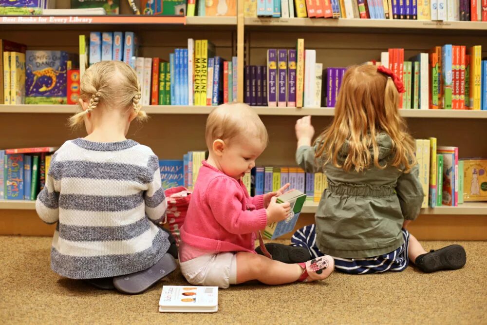 This is our library. Library with children reading. Library for Kids. Library pic for Kids. At the Library for Kids.