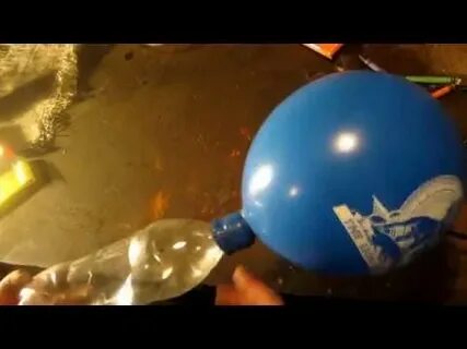 Надутый шарик на бутылке