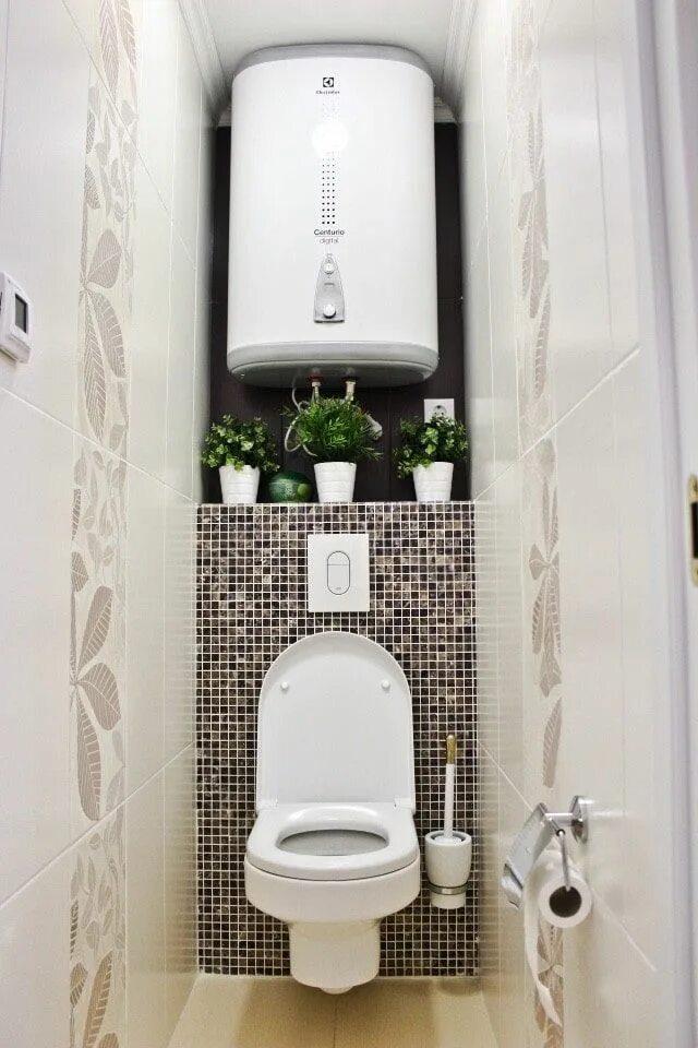 a minimalist guest bathroom with black and white tiles of different sizes, a bla