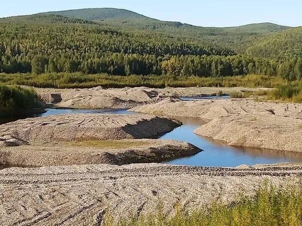 Рудник в приамурье. Золотодобыча в Амурской области. Золотодобыча на Дальнем востоке. Добыча золота на Дальнем востоке. Россыпные месторождения Якутии.