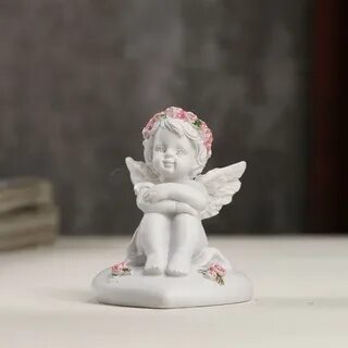 Маленькие фигурки ангелов