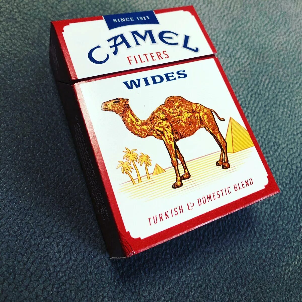 Сигареты кэмел wides. Camel сигареты США. Camel 1913 пачка сигарет. Кэмел сигареты сигареты кэмел.