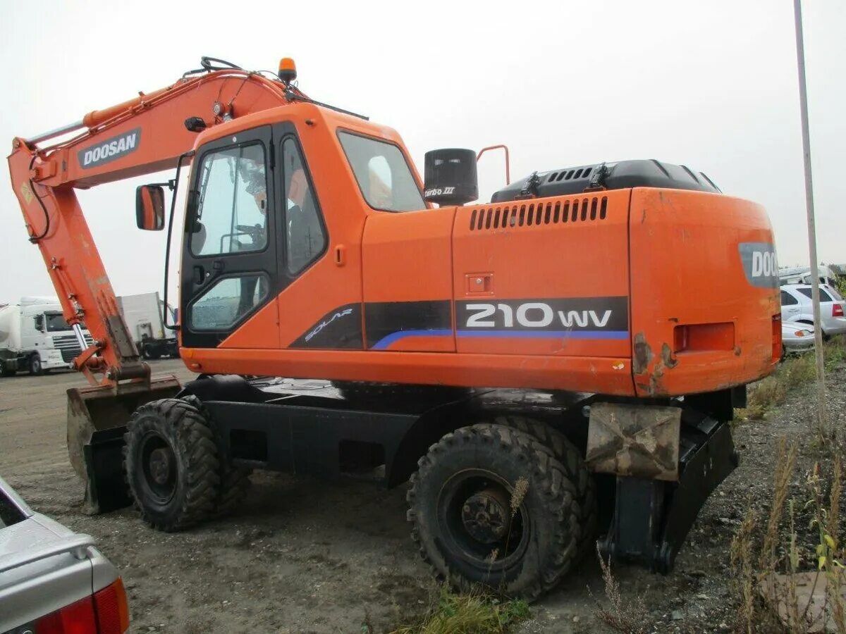 Doosan 210 колесный. Дусан 210 колесный технические. Doosan 210w-v. Экскаватор дусан 210 колесный. Doosan dx210w.