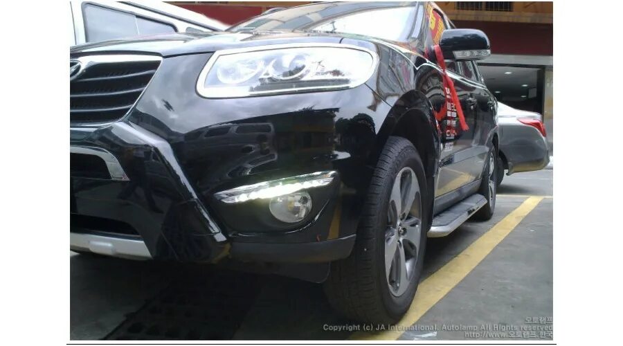 Santa fe 12 года ходовые огни. Дхо в дальний свет санта фе 2. Дхо санта фе 2022. Птф santa fe 3. Ходовые огни на хендай санта фе 2.