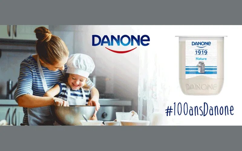 Данон первый логотип. Старый логотип Данон. Слоган Данон. Данон 100 лет.