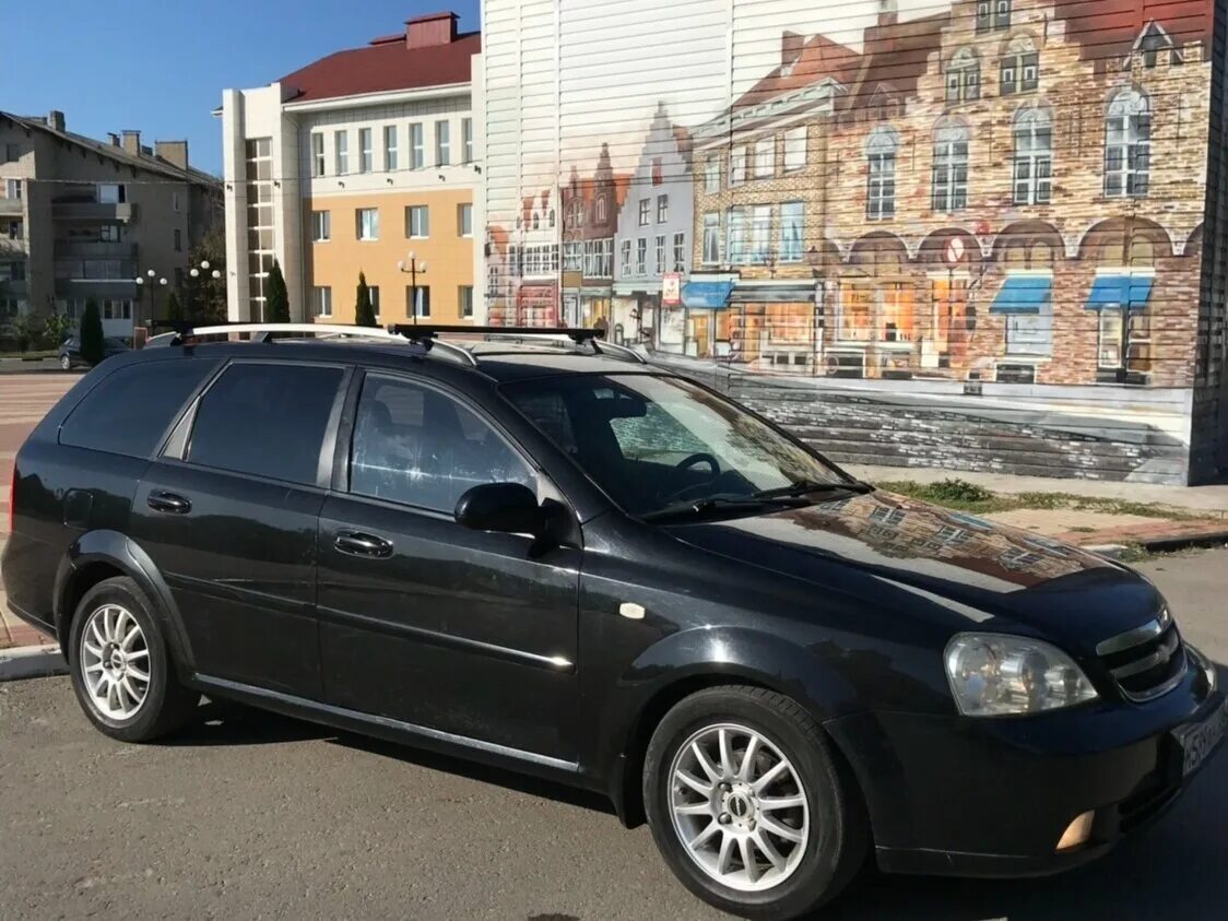 Куплю лачетти б у. Chevrolet Lacetti 2005 универсал. Шевроле Лачетти универсал 1.6. Шевроле Лачетти универсал черный. Chevrolet Lacetti Universal черная.