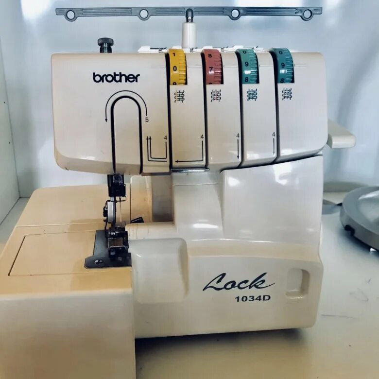 Бротхер 1034 d оверлок. Оверлок brother lock 929d. Brother limited edition 1034d. Brother 1034d. Запчасти для оверлока brother 1034d ролики.