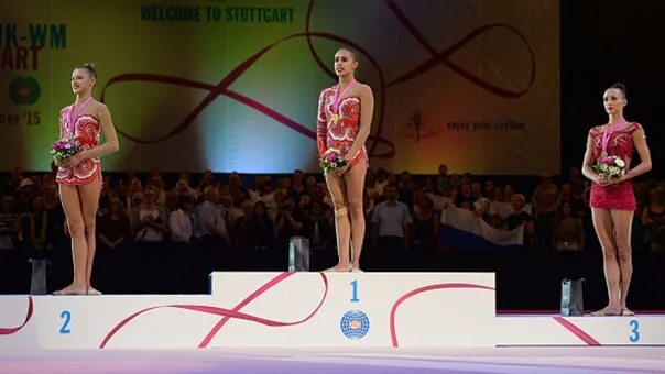 церемония награждения олимпийских игр. российские гимнастки на пьедестале. пьедестал художественная гимнастика. пьедестал художественная гимнастика. гимнастика пьедестал.