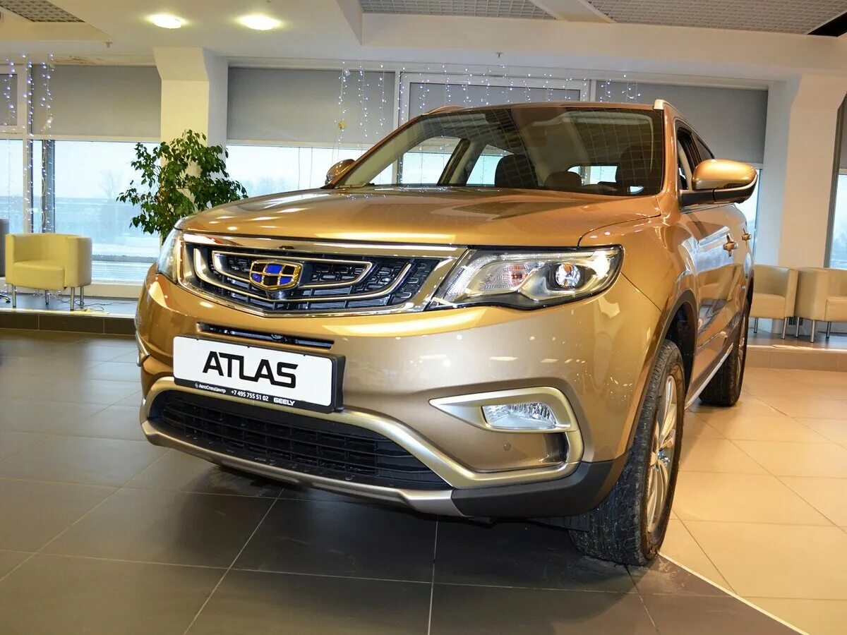 Купить джили атлас 2. Geely Atlas Pro желтый. Новый Джили. Джили золотистый. Imperial Yellow Geely.