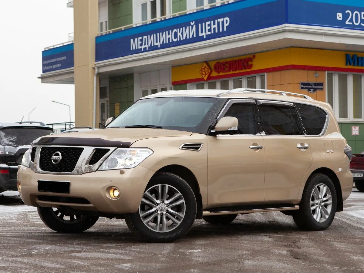 Патрол 2012 год. Ниссан Патрол y62. Nissan Patrol 2012. Nissan Patrol vi (y62). Ниссан Патрол у62 золотистый.