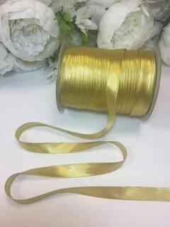 Косая бейка золотая