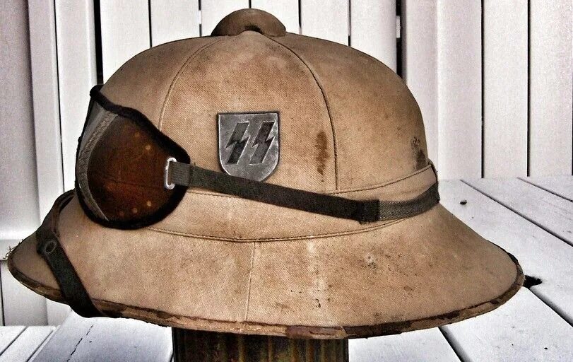 Каска в форме шляпы. Итальянский пробковый шлем м28. Английский колониальный шлем. Колониальный пробковый шлем. Шлем колонизатора.