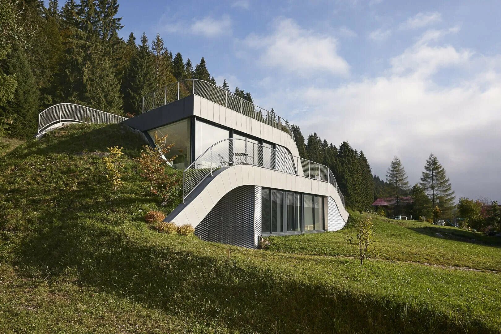 Строительство на холмах. Даниэль Шиндлер Архитектор проекты в Швейцарии. Архитектор Ленберг-холм Голландия.