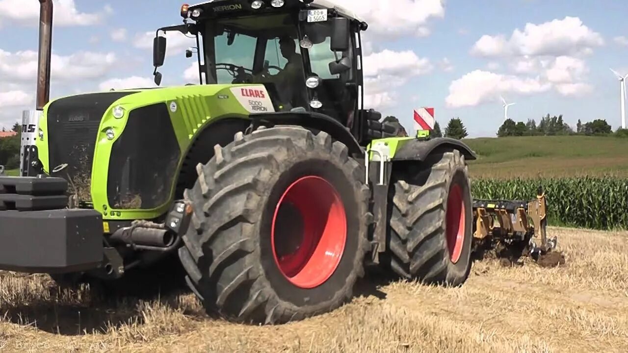 Claas xerion. Трактор claas xerion 5000. xerion 5000 trac. xerion 5000-4000. трактор claas xerion 5000 с плугом.