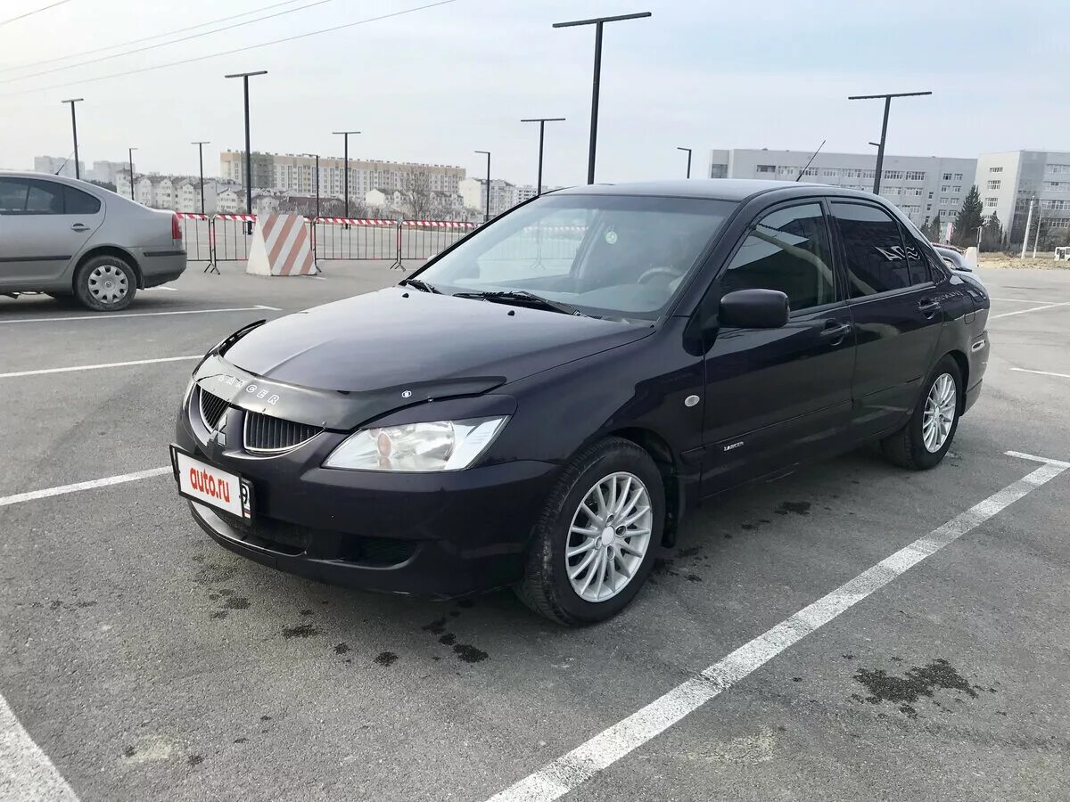 Mitsubishi lancer 2005 года. Mitsubishi Lancer 1.6 2005 чёрный. Мицубиси Лансер 1.6 2005. Мицубиси Лансер 2005. Митсубиси Лансер 2005 черная.