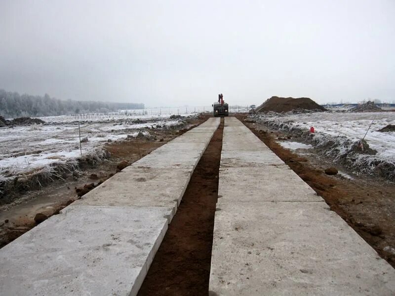 Дорожное покрытие из сборных железобетонных плит. Жб плиты на дорогу. Укладка плит пдн. Дороги из железобетонных плит. Дорожное покрытие из сборных железобетонных плит.