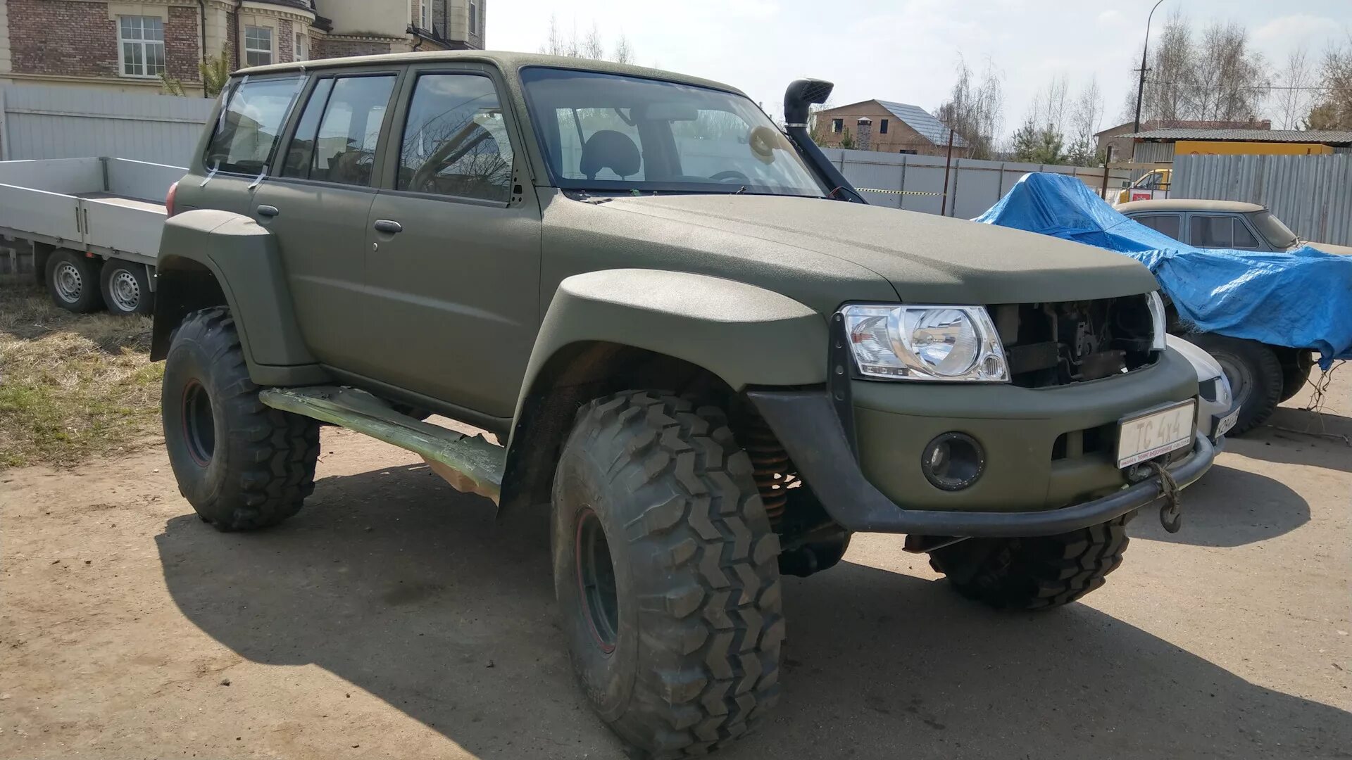 Патрол 61 кузов купить. Nissan Patrol y61. Nissan Patrol 2001 Raptor. Patrol y61 Раптор. Nissan Patrol y61 камуфляж.