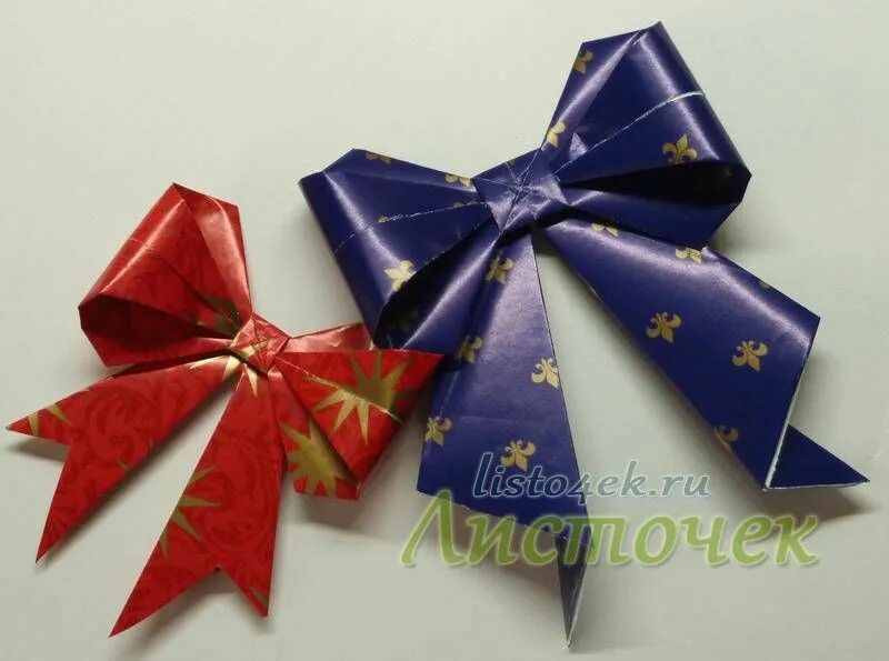 как сделать бантики на елку из бумаги. новогодний бантик из бумаги. новогодние украшения бантики. бантик из бумаги. как сделать бантик из бумаги.