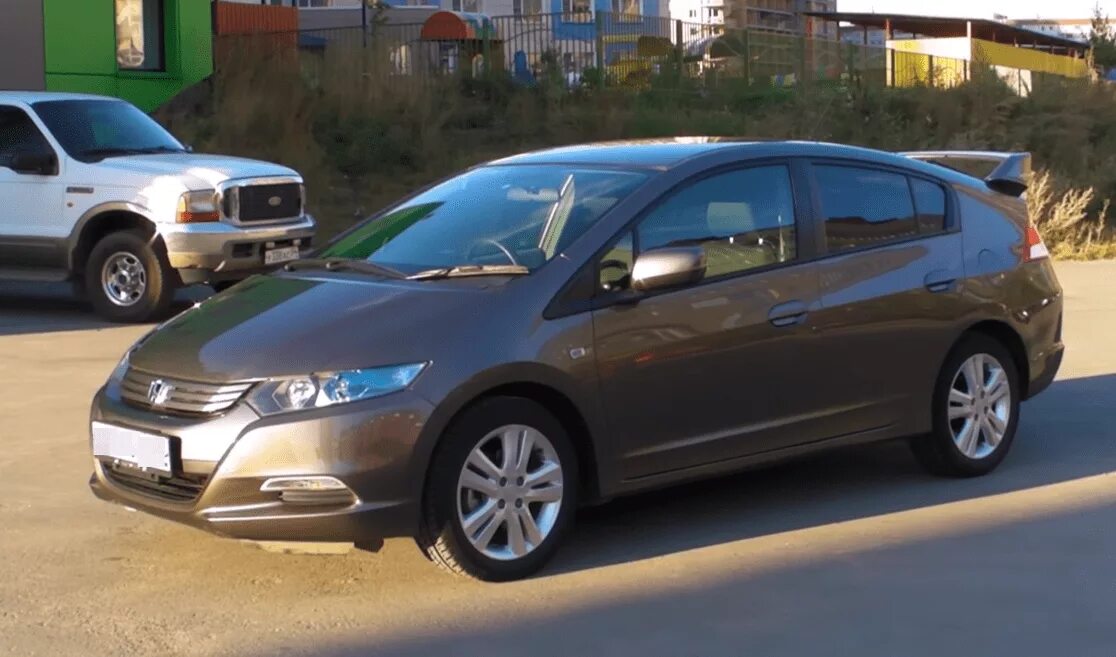 Хонда инсайт диски. Хонда Инсайт 2010. Хонда Инсайт 2010 серая. Honda Insight ze4. Хонда Инсайт зе 3.