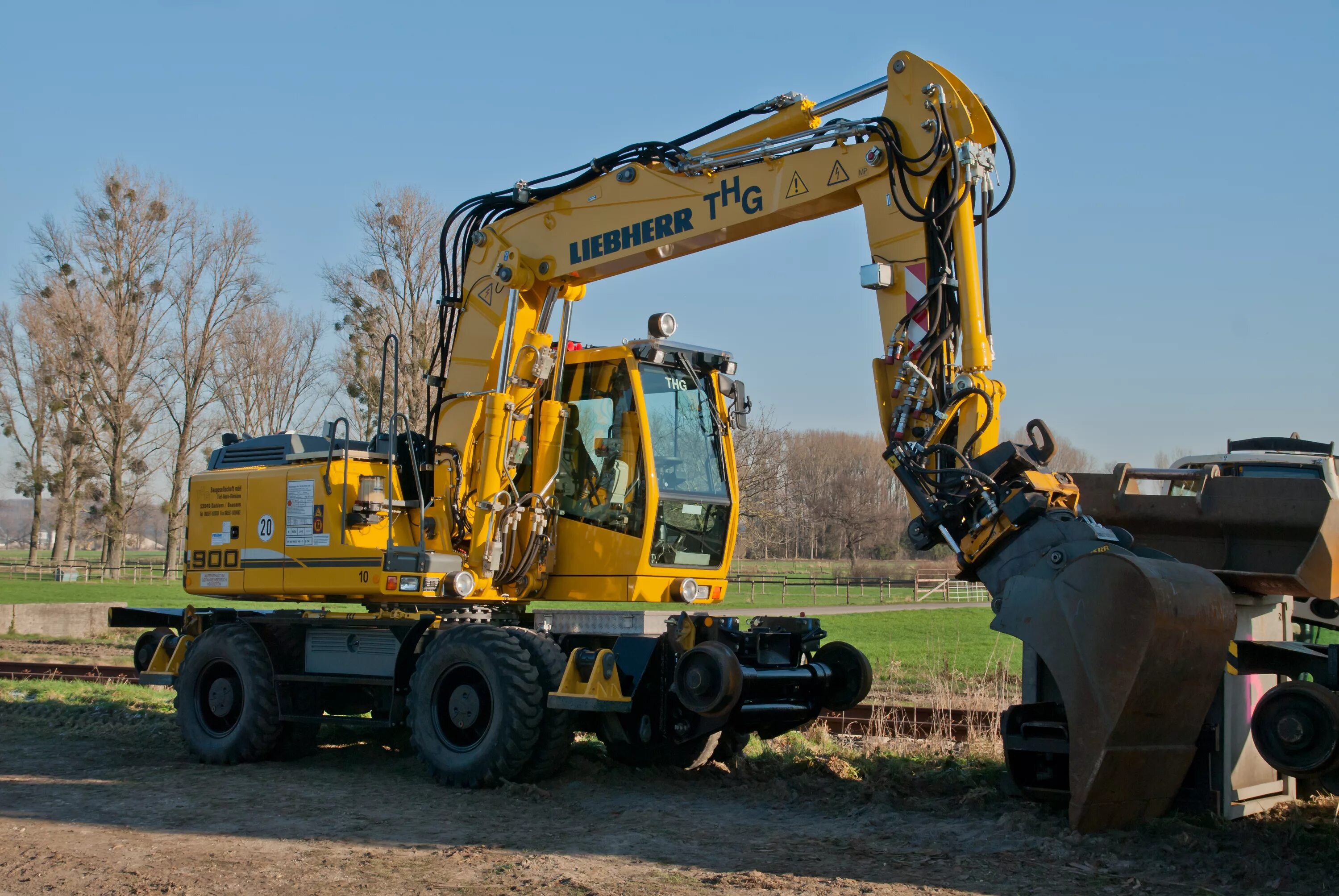 Названия экскаваторов. Экскаватор Liebherr 900. Колесный экскаватор Liebherr а900. Liebherr 900 колесный. Экскаватор колесный Либхер 900.