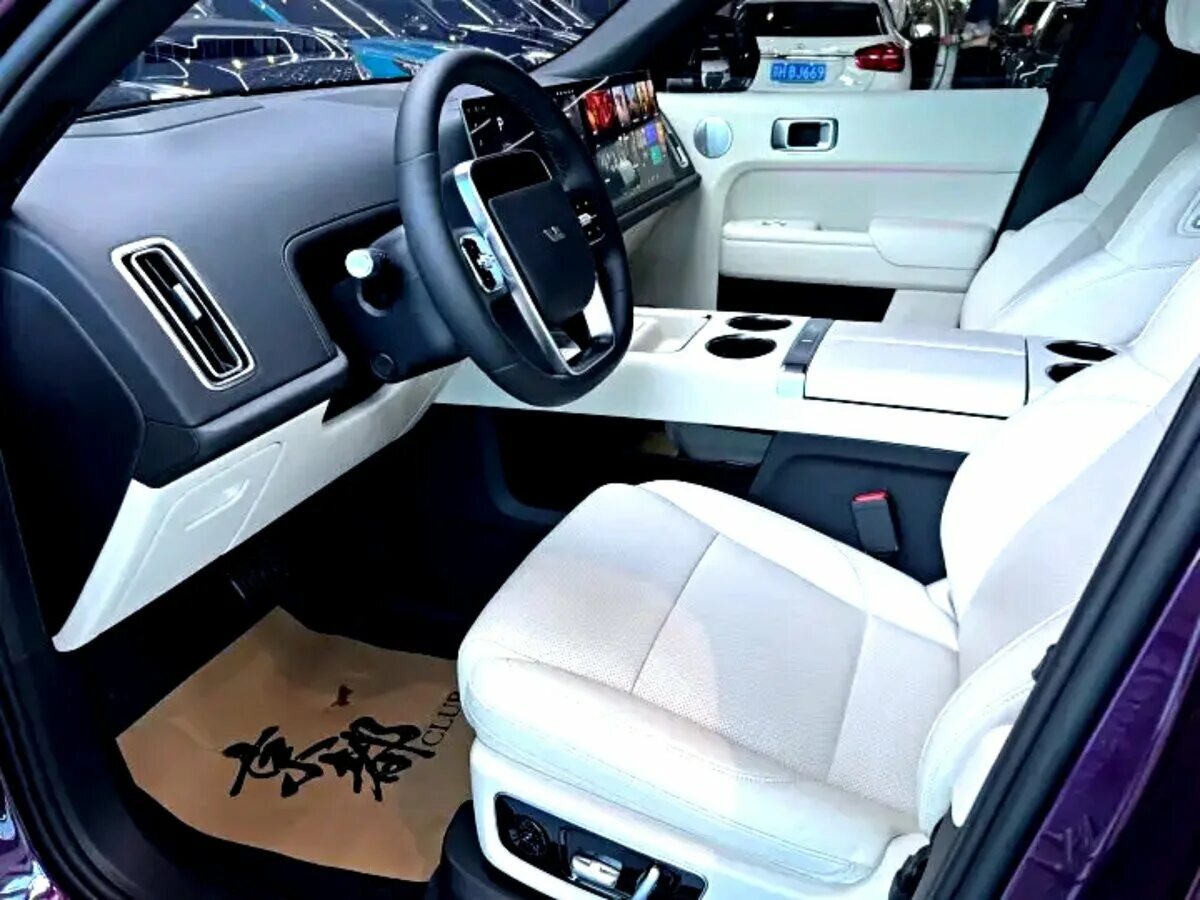 Как заряжать lixiang. Lixiang l9 2025. lixiang l9 фиолетовый. li auto l9 салон. lixiang l9 салон.