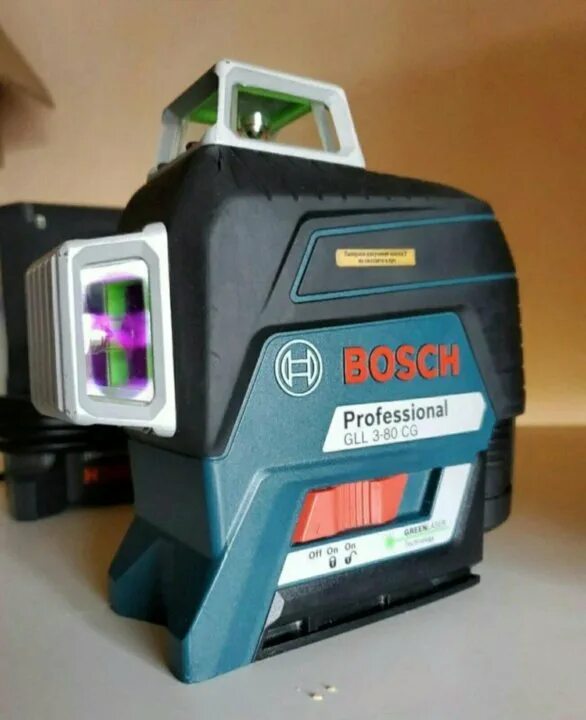 Лазерный нивелир Bosch GLL 3 80 CG 0601063t. Лазерный уровень Bosch GLL 3-80 CG. Лазерный уровень Bosch корпус белый. Лазерный уровень Bosch зеленый.