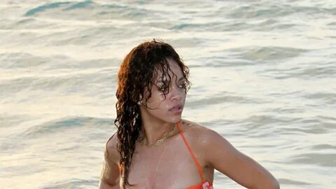 Rihanna Flashes Barbados In See-Thru Bikini Top 