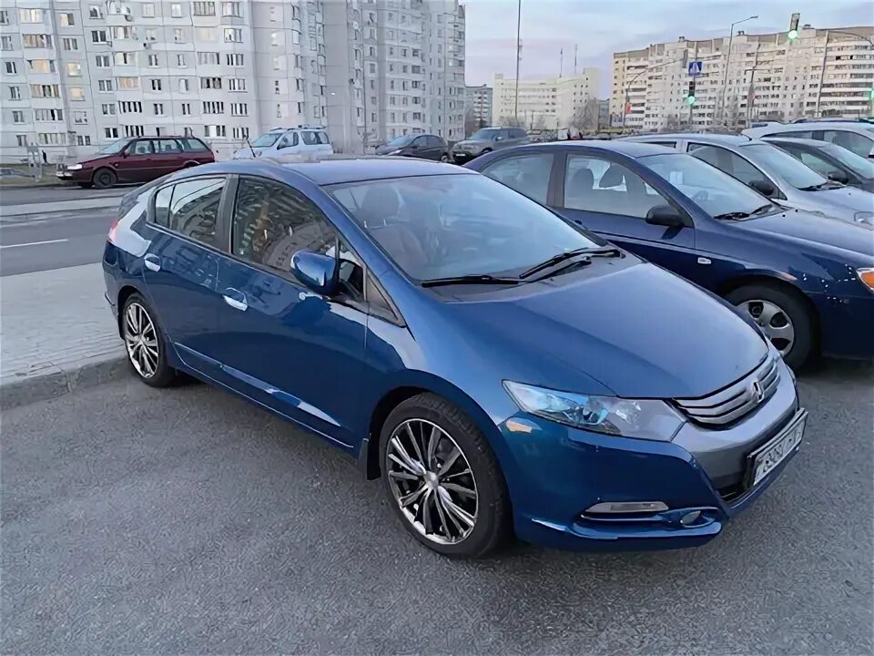 Хонда инсайт диски. Honda Insight 2. Honda Insight ze2. Хонда Инсайт на 17 дисках. Honda Insight r17 Disk.