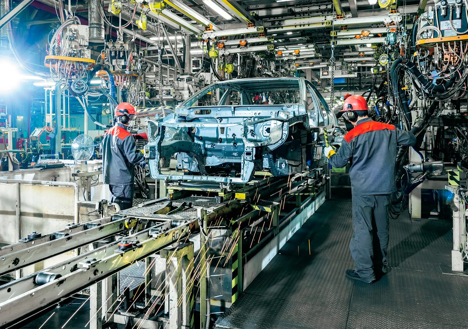 Экономической основой является промышленность крупное машинное производство. Завод Тойота в Санкт-Петербурге. Конвейер Тойота в Японии. Завод автомобилей. Автомобильная промышленность России.