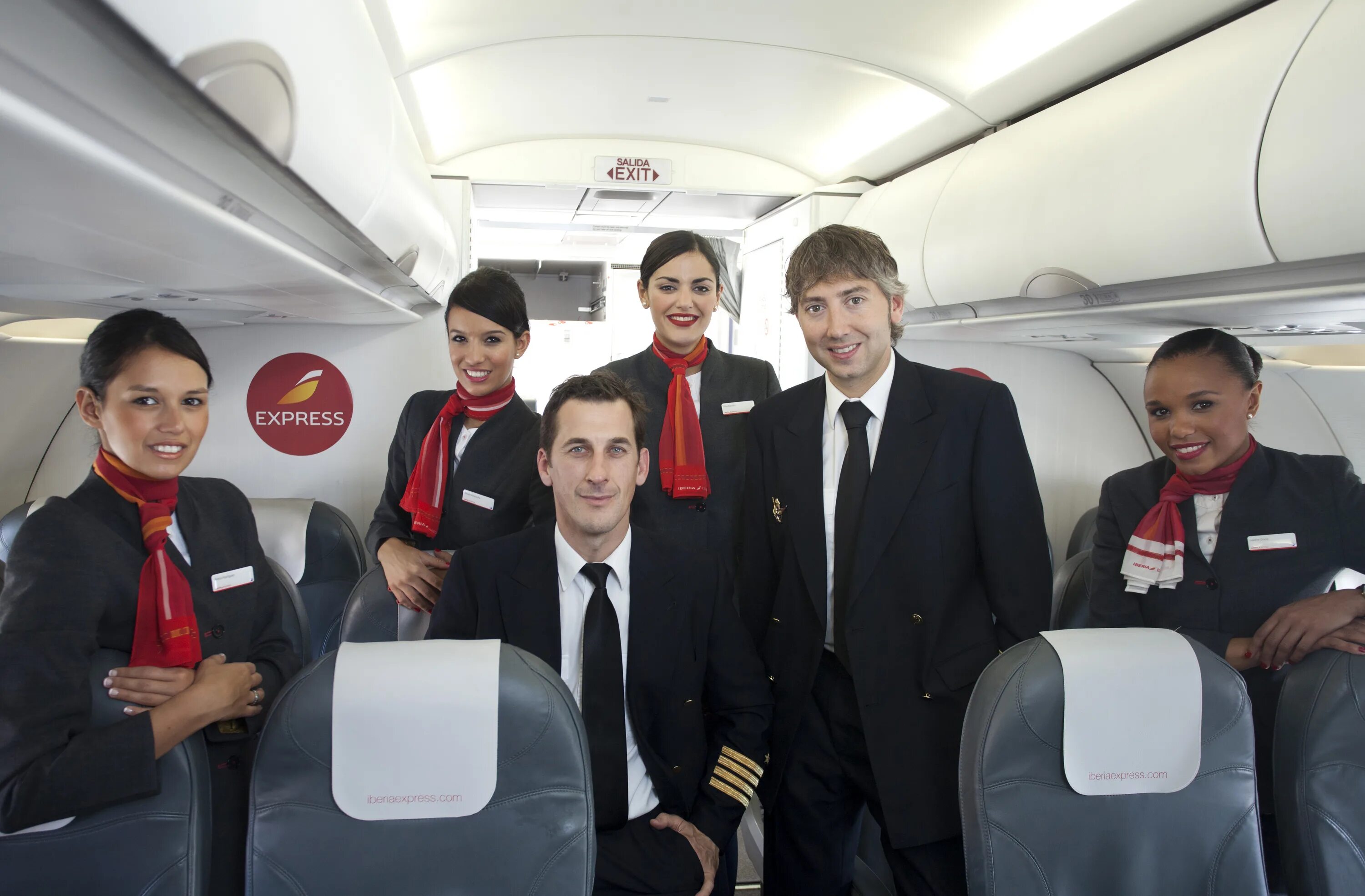 Iberia бортпроводники. Iberia Airlines стюардессы. Iberia экипаж. Iberia 2005. Авиакомпания сунь вынь фото
